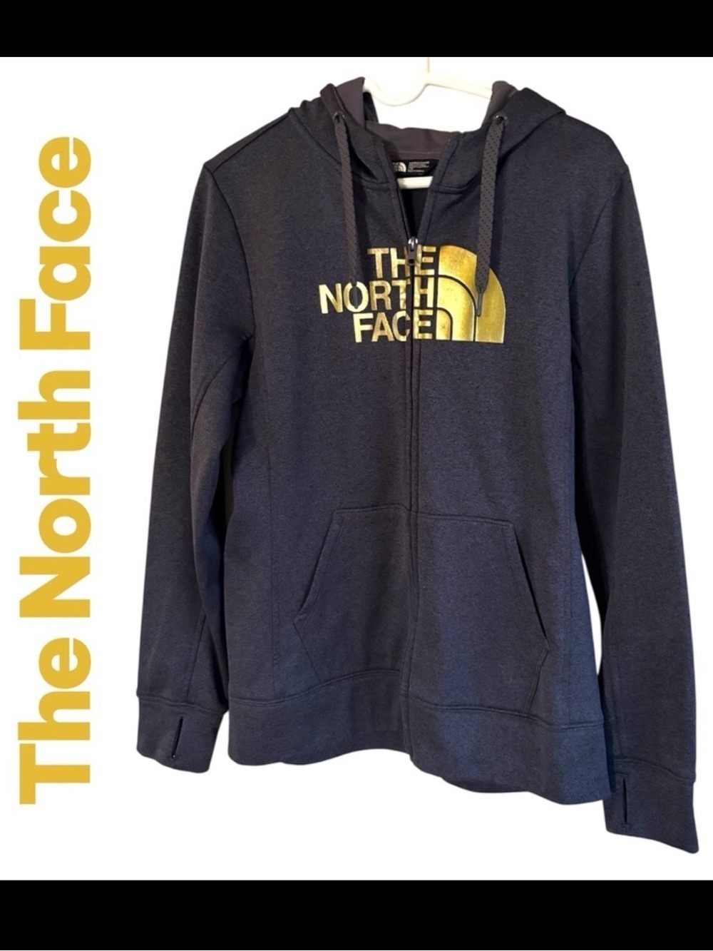 The North Face women’s Large hooded zip up jacket. Dark gray/Gold. Like new! EUC